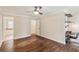 Bedroom featuring hardwood floors and access to the bathroom at 1001 Dunning Se St, Atlanta, GA 30315