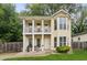 Charming two-story home featuring a welcoming front porch and balcony at 1001 Dunning Se St, Atlanta, GA 30315