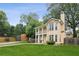 Charming two-story home featuring a welcoming front porch and balcony at 1001 Dunning Se St, Atlanta, GA 30315