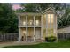 Charming two-story home featuring a welcoming front porch and balcony at 1001 Dunning Se St, Atlanta, GA 30315