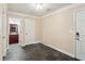 Hallway area with access to the bathroom and an exterior door at 1001 Dunning Se St, Atlanta, GA 30315