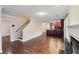 Open floor plan showcasing the kitchen with island and a cozy fireplace at 1001 Dunning Se St, Atlanta, GA 30315