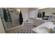 Well-appointed bathroom featuring a jetted tub, separate shower, and a double vanity at 1033 Hawk Creek Trl, Lawrenceville, GA 30043