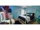 Bright bedroom featuring a canopy bed, decorative lighting, and ample room for personalized decor at 1033 Hawk Creek Trl, Lawrenceville, GA 30043