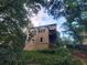 Back of home showing upper level deck at 1033 Hawk Creek Trl, Lawrenceville, GA 30043