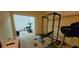 Home gym featuring weight rack and fitness equipment, providing convenience for workouts at 1033 Hawk Creek Trl, Lawrenceville, GA 30043