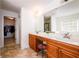 Bathroom with double sinks, tile floors, vanity, walk in closet and shower at 1076 Scenic Park Trl, Lawrenceville, GA 30046