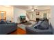 Cozy living room with hardwood floors, fireplace, and comfortable seating at 1076 Scenic Park Trl, Lawrenceville, GA 30046