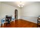 Well-lit office space with hardwood floors and elegant wall trim at 1076 Scenic Park Trl, Lawrenceville, GA 30046