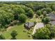 Aerial view of the well-manicured lawns, walking path and common areas within the community at 115 Pinnacle Ln, Mcdonough, GA 30253