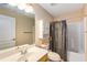 Full bathroom with neutral paint, white fixtures, and shower-tub combination at 115 Pinnacle Ln, Mcdonough, GA 30253