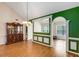 Spacious dining area with hardwood floors and decorative wall accents at 115 Pinnacle Ln, Mcdonough, GA 30253