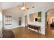 Open living room with hardwood flooring, neutral paint, and traditional style furnishings at 115 Pinnacle Ln, Mcdonough, GA 30253