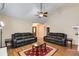 Bright living room with comfortable furniture and a view of the front entrance at 115 Pinnacle Ln, Mcdonough, GA 30253