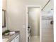 Bathroom features a granite countertop, modern fixtures, and a separate shower area at 385 Stonebridge Trl, Roswell, GA 30075