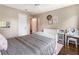 Spacious bedroom with hardwood floors, neutral paint and vanity area at 385 Stonebridge Trl, Roswell, GA 30075