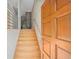Welcoming entryway featuring stairs, white brick wall, and a glimpse of the home's interior at 1344 Fernwood Ne Cir, Brookhaven, GA 30319