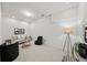 Cozy living room with neutral carpet, stylish furniture, and modern decor accents at 1344 Fernwood Ne Cir, Brookhaven, GA 30319