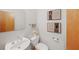 Contemporary powder room with sleek fixtures, modern art and a decorative mirror creates a cozy and stylish space at 1344 Fernwood Ne Cir, Brookhaven, GA 30319