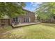 Enjoy the spacious backyard with an expansive deck, great for entertaining guests and outdoor activities at 224 Farm Manor Ct, Lawrenceville, GA 30045