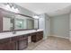 Bathroom vanity with dual sinks and large mirror at 224 Farm Manor Ct, Lawrenceville, GA 30045