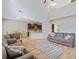 Open floor plan connects the living room and kitchen creating a spacious and inviting area for gatherings at 224 Farm Manor Ct, Lawrenceville, GA 30045