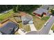 Stunning aerial view of a charming two-story home with fenced yard and inviting curb appeal at 255 Webster Lake Dr, Temple, GA 30179