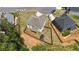 Lovely home with fenced backyard, complete with patio and small outbuilding at 255 Webster Lake Dr, Temple, GA 30179