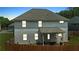 The home features a fenced backyard and covered patio, perfect for outdoor entertaining at 255 Webster Lake Dr, Temple, GA 30179