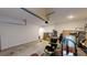 Garage interior view, showing open space, storage, and overhead door mechanism at 255 Webster Lake Dr, Temple, GA 30179