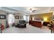 Spacious main bedroom featuring a ceiling fan, natural light, and room to relax at 255 Webster Lake Dr, Temple, GA 30179