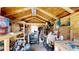 Shed's interior is well-organized, featuring ample storage for gardening equipment and tools at 255 Webster Lake Dr, Temple, GA 30179