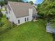 Aerial view of the house with its fenced backyard, small patio and shed offering lots of storage space at 3042 Oak Vista Way, Lawrenceville, GA 30044