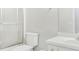 Clean bathroom with a toilet, vanity, and shower with sliding glass door at 3042 Oak Vista Way, Lawrenceville, GA 30044