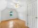 Bright bedroom with vaulted ceiling, hardwood floors, and natural light at 3042 Oak Vista Way, Lawrenceville, GA 30044