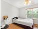 Cozy bedroom with hardwood floors and natural light at 3042 Oak Vista Way, Lawrenceville, GA 30044