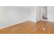 Spacious bedroom featuring hardwood floors and natural light at 3042 Oak Vista Way, Lawrenceville, GA 30044