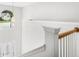 Bright hallway with beautiful pendant lighting and outdoor view at 3042 Oak Vista Way, Lawrenceville, GA 30044