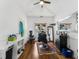Cozy room featuring hardwood floors, ample light, and professional hair styling equipment at 3042 Oak Vista Way, Lawrenceville, GA 30044