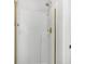 Clean, bright shower with white tile and gold trim at 3042 Oak Vista Way, Lawrenceville, GA 30044