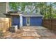 Backyard with wooden fence, door to unit, and a mix of concrete and stone patio at 3799 Henry Ct, Acworth, GA 30101