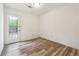 Simple bedroom with a door to the exterior, offering easy access and natural light at 3799 Henry Ct, Acworth, GA 30101