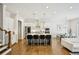 Bright and spacious kitchen showcases a center island, stainless steel appliances, and a seamless connection to the living area at 20056 Windalier Way, Roswell, GA 30076
