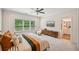 Spacious main bedroom with carpet, a ceiling fan, and en-suite bathroom at 20056 Windalier Way, Roswell, GA 30076