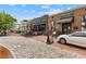 Charming shops and restaurants along a brick-paved walkway, offering a delightful and walkable neighborhood experience at 20056 Windalier Way, Roswell, GA 30076