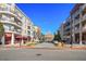 Charming street view featuring a mix of retail and residential buildings at 20056 Windalier Way, Roswell, GA 30076