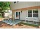Backyard patio with outdoor seating, offering a relaxing view of the yard at 5341 Tall Oak Dr, Marietta, GA 30068
