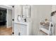 Bathroom featuring a modern vanity, mirror, and stylish fixtures at 5341 Tall Oak Dr, Marietta, GA 30068
