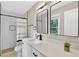 Modern bathroom with white vanity, stylish mirrors, and walk-in shower at 5341 Tall Oak Dr, Marietta, GA 30068