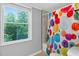 Bright bathroom with a window, bathtub, and modern shower curtain at 5341 Tall Oak Dr, Marietta, GA 30068